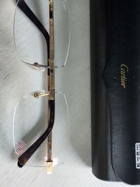 Cartier Men's Rimless Sunglasses - Gold Frame, Black Lenses